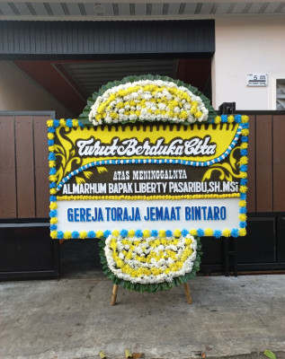 Papan Bunga Duka di Penumping